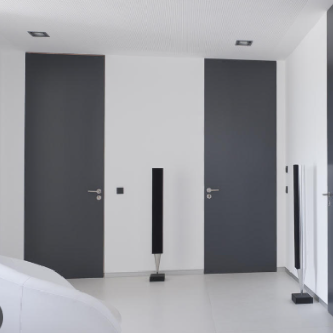 Flush wall door is a type of door that sits completely flat within the surrounding wall, creating a seamless and smooth surface when closed.
